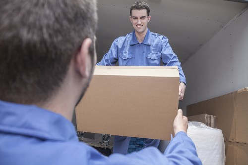Removal van and moving boxes in Brompton