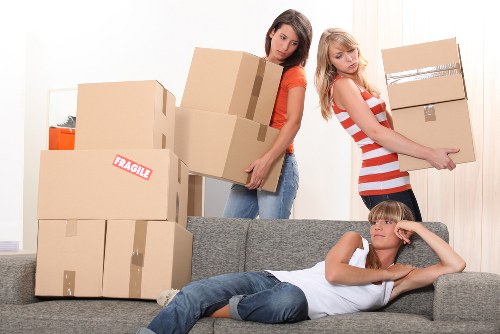 Packed storage unit in Brompton with labeled boxes and furniture